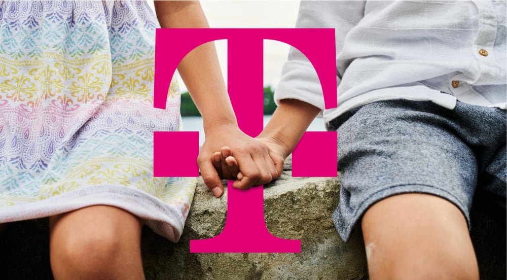 Holding hands with Telekom logo